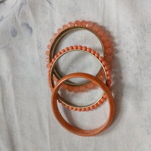 Set of 3 orange/coral bangles